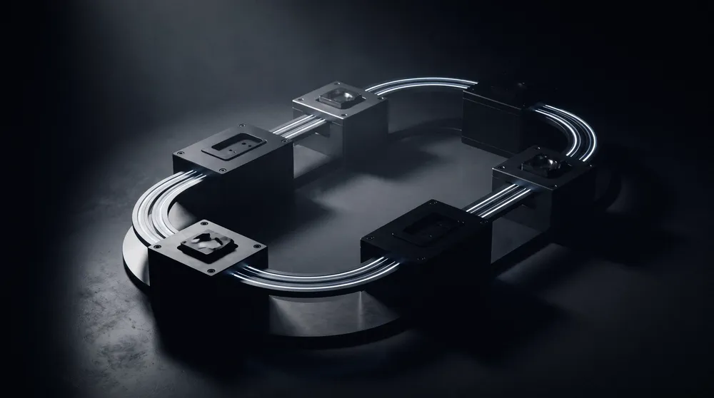 Machined black modules connected in a closed loop by channels of white light on a dark surface.